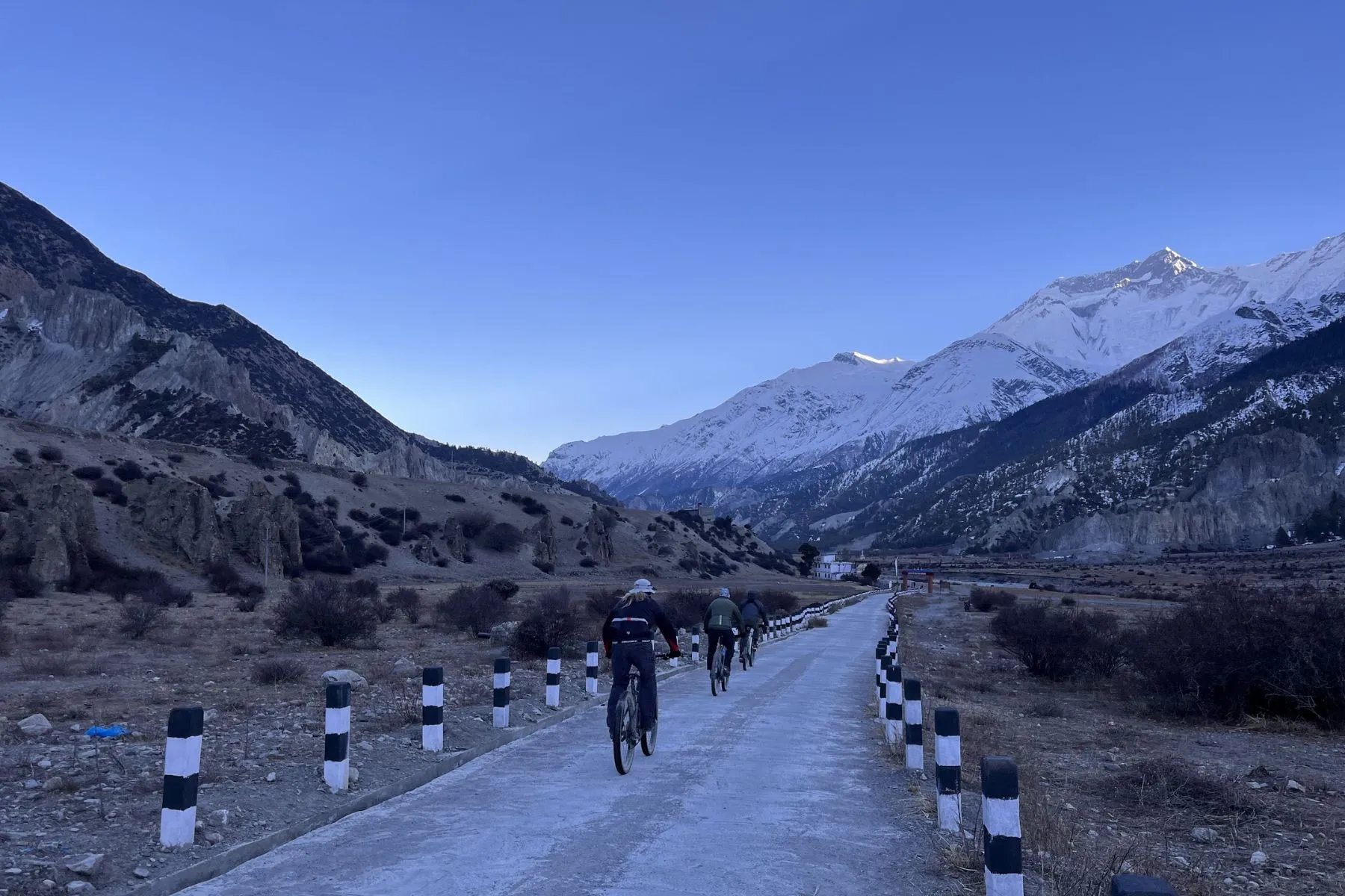 Cyclists passing through Manang